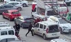Polis merkezi önünde sopayla darp kamerada
